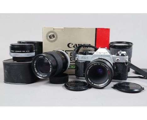 A Canon AE-1 Program SLR Camera, chrome, serial no 4759789, shutter working, shutter button jammed only fired with quick rele