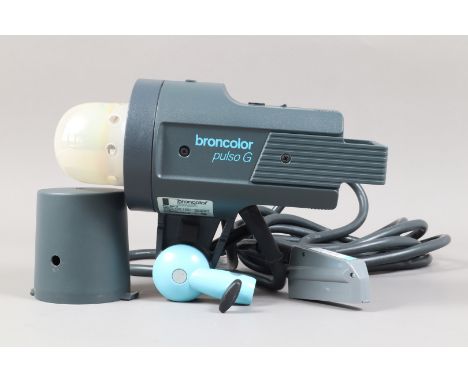 A Broncolor Pulso G Flash Head,  Type 32 121.01-16, 3200J flash tube, untested, some light wear, G, in maker's box, with addi