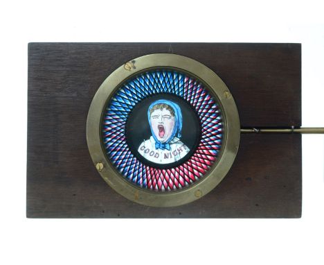 Mahogany-Mounted Magic Lantern Slides,  hand-coloured rackwork slides, inset brass rings - 'Good Night', with geometric surro