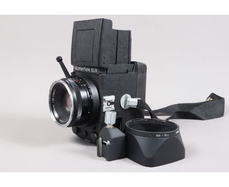 A Rolleiflex SLX Camera, battery flat, no charger, signs of battery leakage, untested, body G, light wear, with Rollei HFT 80
