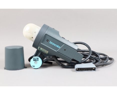 A Broncolor Pulso F4 Flash Head, Type 32 126 10-16, 3200J flash tube, untested, some light wear, G, in maker's box, with addi