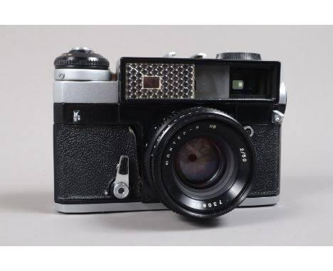 A Kiev-5 Rangefinder Camera, serial no 7300654, body G, leatherette peeling above self-timer, shutter faulty, rangefinder wor