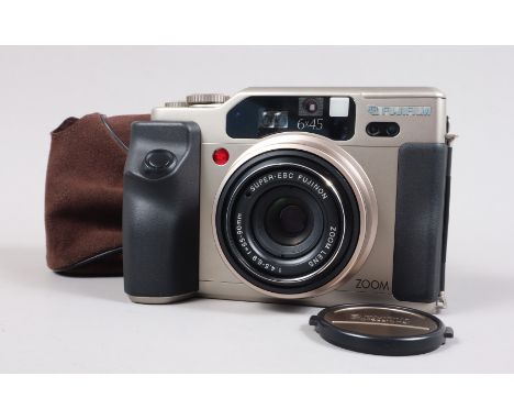 A Fujifilm GA645Zi Professional 6 x 4.5 Camera, serial no 3030414, powers up, shutter working, flash working, appears to func