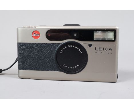 A Leica Minilux Compact Camera, serial no 2092317, 1995, powers up, shutter working, meter responsive, flash working, appears