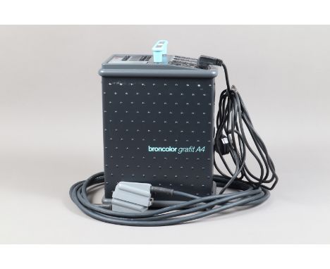 A Broncolor Grafit A4 3200J Power Pack, untested, some light surface marks, G-VG, with outer sleave, in maker's box, with two