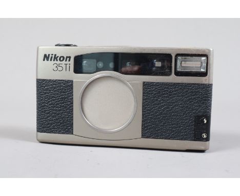A Nikon 35Ti Compact Camera, powers up, shutter working, meter responsive, flash working, appears to function as should, nios