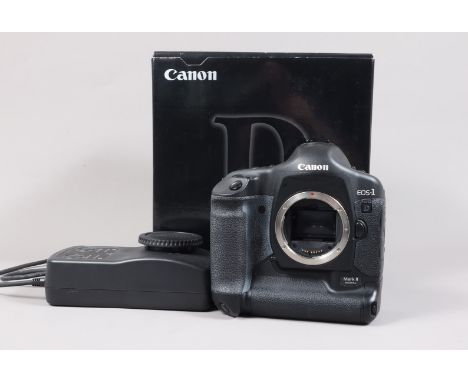 A Canon EOS-1 D Mark II DSLR Camera Body, serial no 245936, powers up, shutter working, appears to function as should, body G