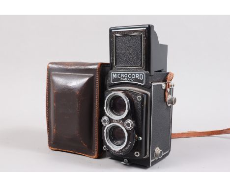 An M.P.P. Microcord II TLR Camera, shutter sluggish on slow speeds, body G, light paint wear to edges, with Ross Xpress 77.5m