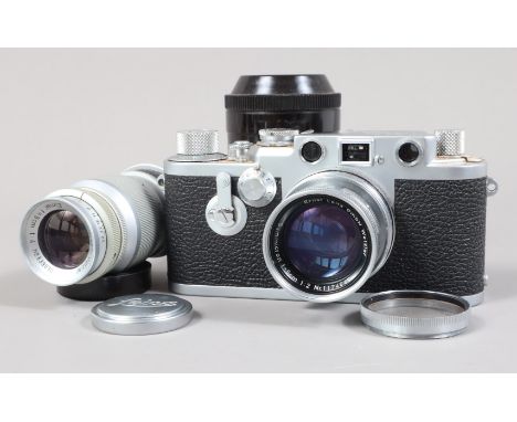 A Lietz Wetzlar Leica IIIf Camera, seriail no 716061, 1954, red dial, shutter very sluggish, self timer working, viewfider cl