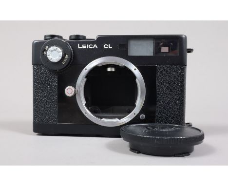 A Leitz Wetzlar Leica CL Compact Rangefinder Body, serial no 1301223, 1973-4, body G, shutter working, metre untested, with b