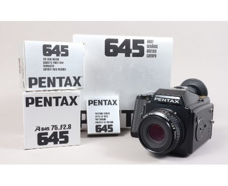 A Pentax 645 Camera, serial no 1031393, powers up, shutter fires, display working, not film tested, body G-VG, light wear, in
