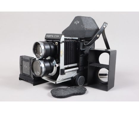 A Mamiya C330 Professional TLR Camera, serial no D55912, body G, some light wear, bellows VG, all functions smoothly, with Ma