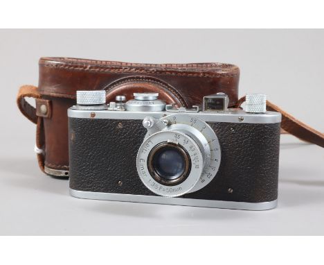 A Leitz Leica Standard Camera, model E, serial no 123141, 1934, shutter working, body G, light wear to leatherette on right h