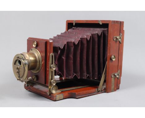 A J. Lancaster &amp; Son Instantograph Half Plate Field Camera, mid 1890s, square-cornered red bellows G, double extension, r