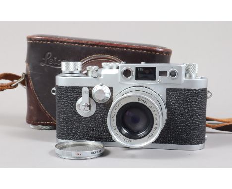 A Leitz Wetzlar Leica IIIg Camera, serial no 905 292, 1957, shutter working, on slow speed setting shutter erratic on one sec