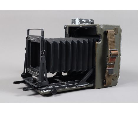 A Graflex KE-12(1) 5 x 4in Pacemaker Speed Graphic Military Camera Body, serial no 895110, olive green body P-F, white corros