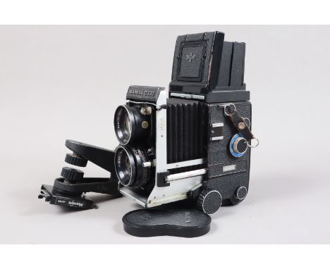 A Mamiya C330 Professional F TLR Camera, serial no D 112684, body G, paint wear to edges, vbellows G, shutter button working,