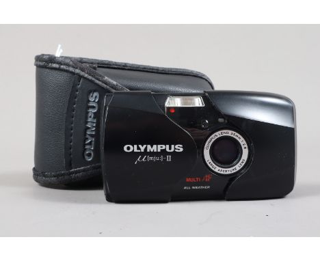 An Olympus mju II Compact Camera, powers up, shutter working, flash working, body G, light scratch to front, elements G-VG, i