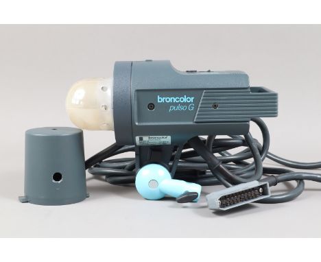 A Broncolor Pulso G Flash Head, Type 32 121.01-16, 3200J flash tube, untested, some light wear, G, in maker's box, with addit