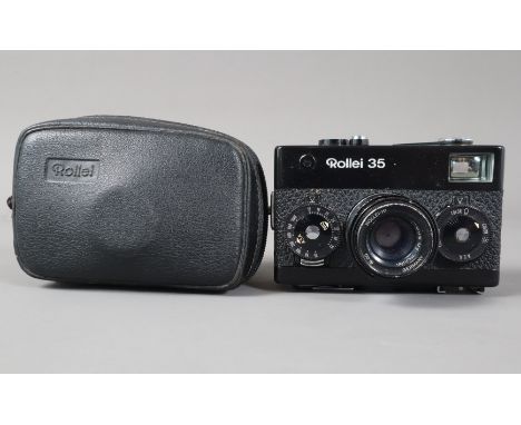 A Rollei 35 Compact Camera, black, shutter working, meter appears unresponsive, body G, light wear, with 40mm f/3.5 Tessar le
