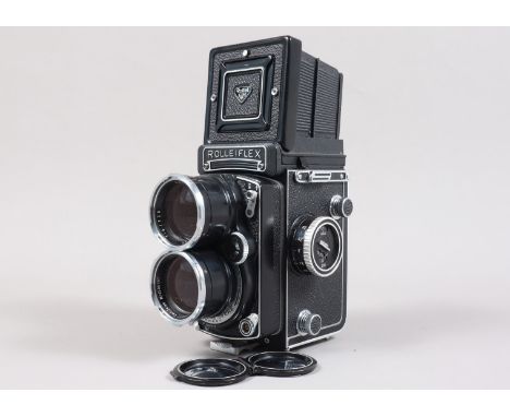A Tele Rolleiflex TLR Camera, type 2, serial no S 2307098, shutter working, sluggish on one second, body G-VG, small spots of