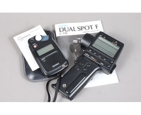 Two Sekonic Light Meters, a Sekonic Flashmate model L-308B, powers up, appears to function as should amd a Sekonic Dual Spot 