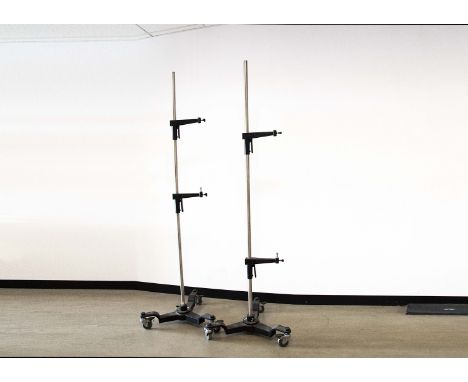 Two Fobo Lamp Stands, three wheeled stand, ball baring casters, with breaks, steel tubeing, stands 2 metres approx, each with