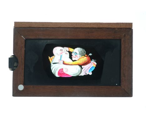 Mahogany-Mounted Magic Lantern Slides,  hand-coloured comic slipping slides - doubles, one glass missing (8) and symmetrical-