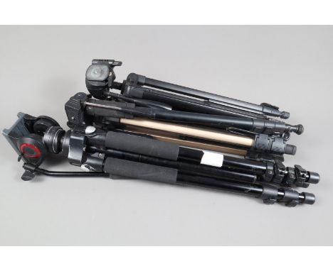 A Manfrotto Fluid Head Professional Tripod and Velbon Tripods, a professional tripod with MVH500AH fluid drag system pan and 