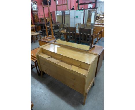 A 1960's light oak dressing table