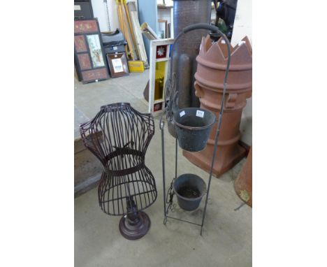 A table top mannequin and a two tier planter