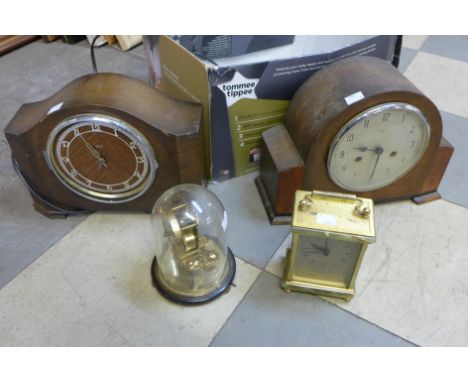 Two Art Deco oak mantel clocks, carriage clock and an anniversary clock