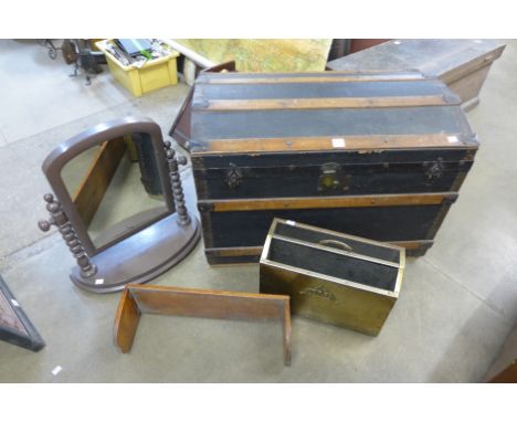 A dome topped steamer trunk, painted Victorian toilet mirror, brass magazine rack and a folding book rack