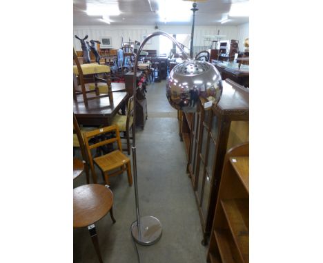 A chrome standard lamp