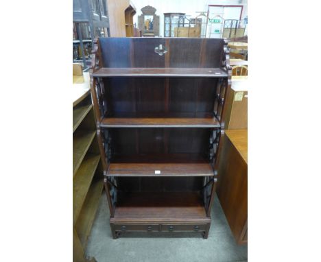 A Chinese Chippendale Revival mahogany four tier wall shelf