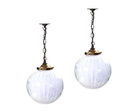 TWO ETCHED GLASS GLOBE LIGHT FITTINGS WITH BRASS MOUNTS.HEIGHT: 12 INCHES.DIAMETER: 22 INCHES.IN GOOD CONDITION.