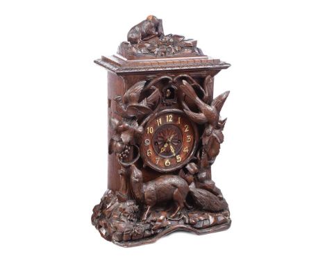 BLACK FOREST CUCKOO CLOCK WITH DOUBLE FUSEE MOVEMENT & A DIAL OF 7 INCHES.RAISED ON A SHAPED PLYNTH BASE. GANTER BROTHERS, DU