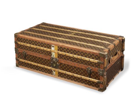 Monogram Wardrobe Trunk,Louis Vuitton, early 20th century, Stenciled monogram and wood bound, fitted and complete interior wi