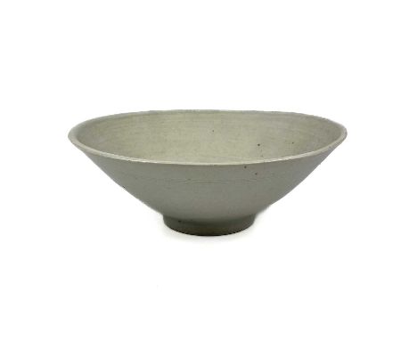 Bernard Howell LEACH (1887-1979) A footed porcelain bowl with celadon glaze Impressed personal and Leach Pottery seal.Height: