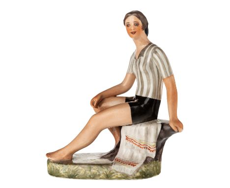 A RUSSIAN PORCELAIN FIGURE OF A FEMALE FOOTBALL PLAYER AFTER ALEKSANDR SAMOKHVALOV (RUSSIAN 1894-1971), LENINGRAD PORCELAIN F