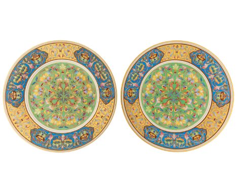 A PAIR OF RUSSIAN PORCELAIN PLATES, KORNILOV PORCELAIN FACTORY, ST. PETERSBURG, 1884-1917 the two circular plates painted in 