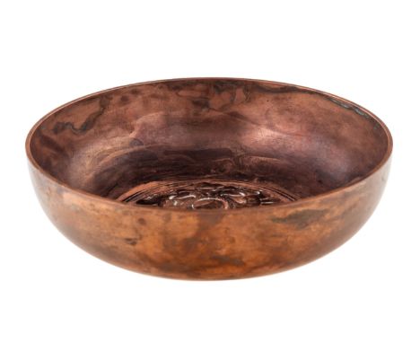 A FABERGE COPPER ASHTRAY, 1914-1915 a circular ashtray impressed with Imperial eagle and inscription in Russian: Voina 1914 g