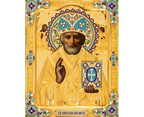 A RUSSIAN ICON OF ST. NICHOLAS THE WONDERWORKER WITH GILT SILVER, CHAMPLEVE AND CLOISONNE ENAMEL OKLAD, ST. PETERSBURG, 1899-