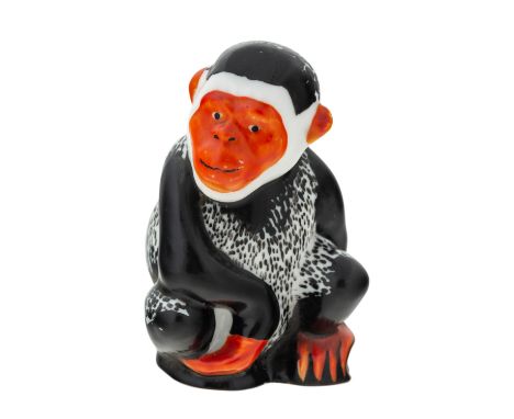 A SOVIET PORCELAIN CHESS PIECE OF A BLACK MONKEY AFTER ZIGRID KULBACH (RUSSIAN 1908-1997), LENINGRAD PORCELAIN FACTORY, CIRCA