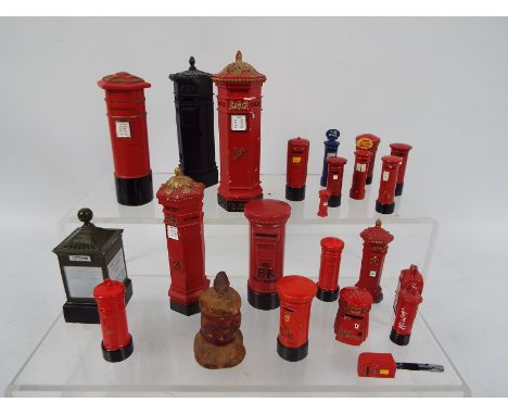 A group of miniature and small scale Post office pillar box models, smallest approximately 2 cm (h).