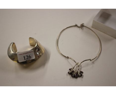 A C Baquise of Paris white metal bangle; and a white metal enamel pendant necklace stamped 925