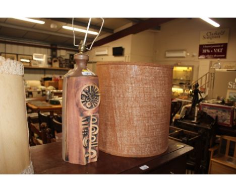 A pottery table lamp with shade 