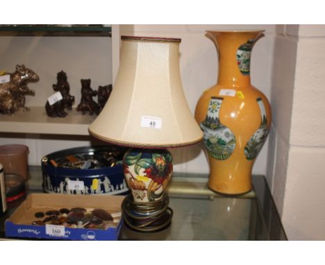 A Moorcroft Pottery table lamp and shade