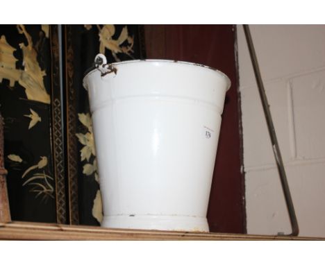 A white enamel bucket 