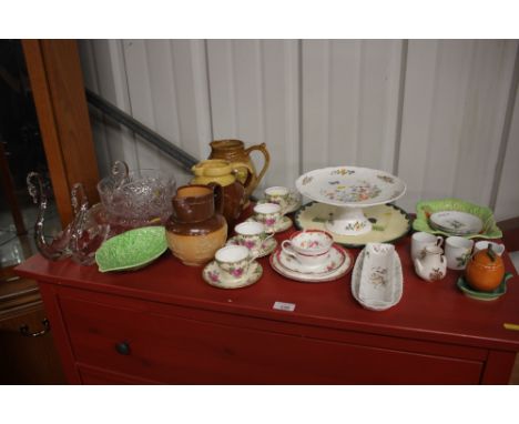 An Aynsley Cottage Garden cake stand; a Doulton Lambeth Harvestware jug; a set of four Aynsley rose decorated coffee cups and